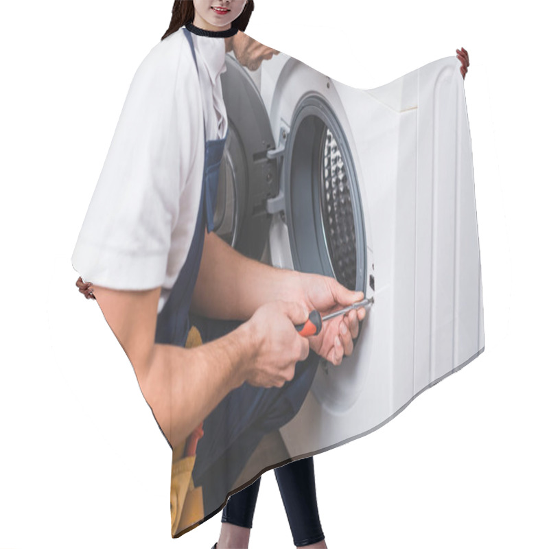 Personality  Cropped View Of Adult Repairman Working With Screwdriver While Repairing Washing Machine In Bathroom  Hair Cutting Cape