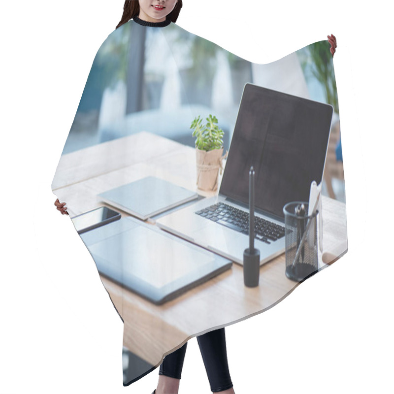 Personality  Laptop And Graphics Tablet With Smartphone On Tabletop Hair Cutting Cape