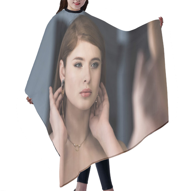 Personality  Young Stylish Female Model With Earrings Looking At Own Reflection Hair Cutting Cape