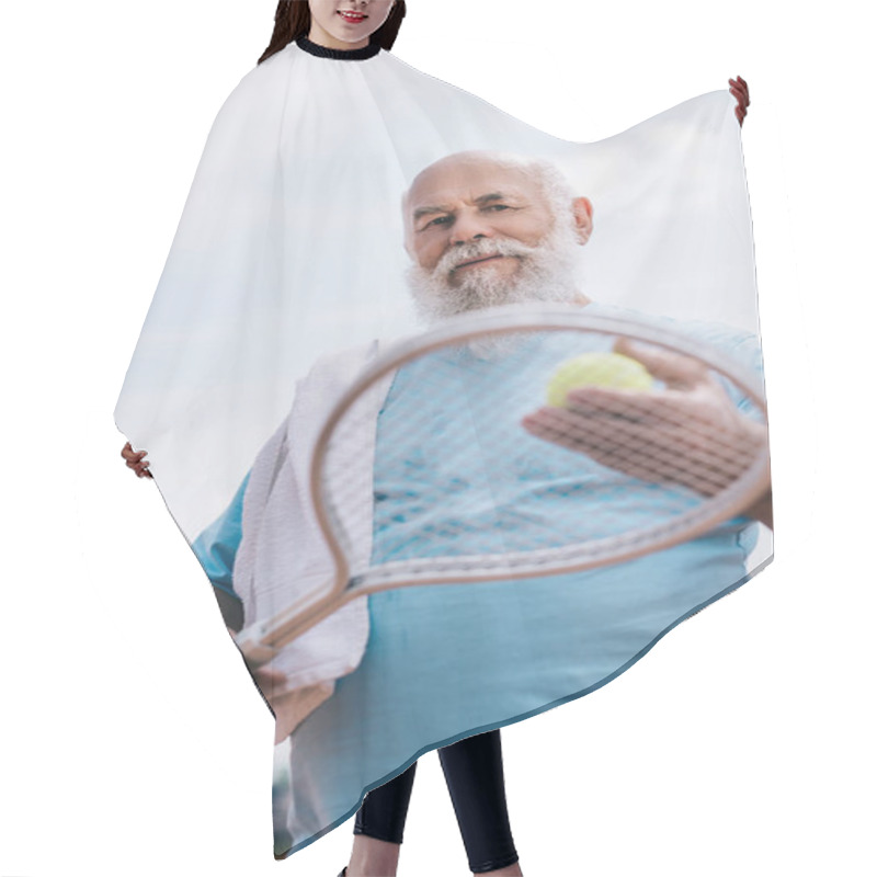 Personality  Low Angle View Of Old Man With Towel And Tennis Equipment In Hands Hair Cutting Cape