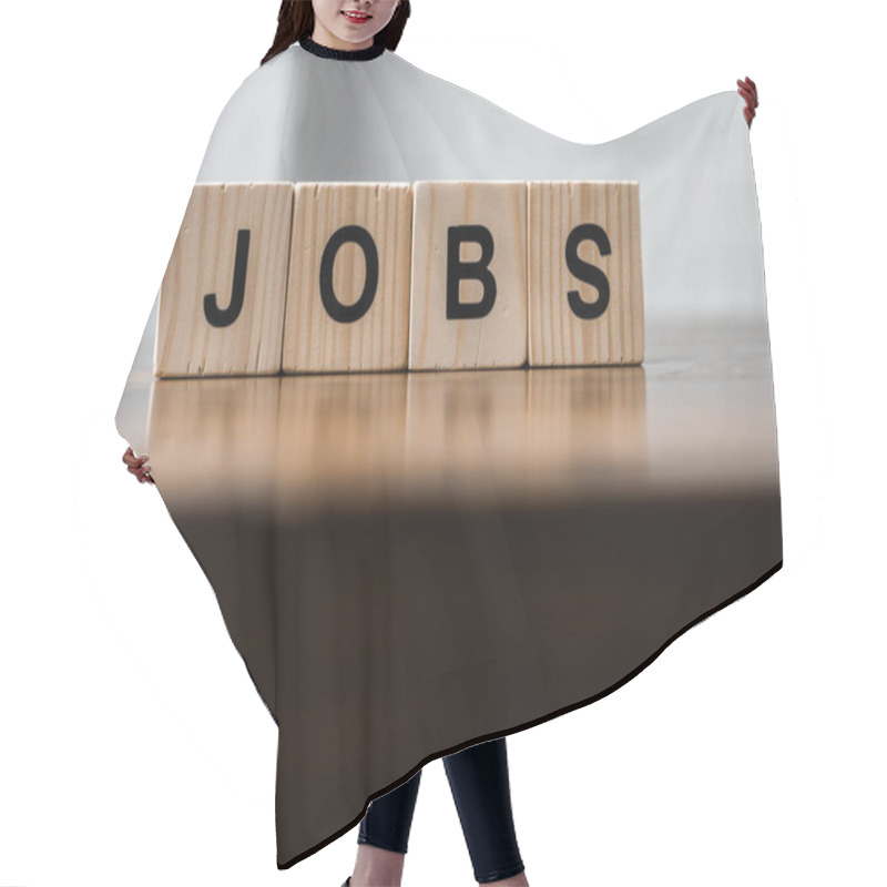 Personality  Close-up Shot Of Blocks With JOBS Sign On Wooden Table Hair Cutting Cape