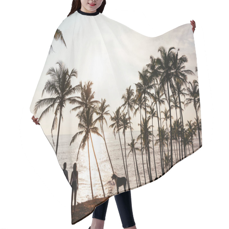 Personality  Silhouette Of A Couple In Love On The Beach. Silhouette Of Lovers At Sunset. Honeymoon Trip. Guy And Girl On The Beach. Lovers Among Palm Trees. Man, Woman And Dog. Couple Travels. Couple At Sunset. Wedding Travel Hair Cutting Cape