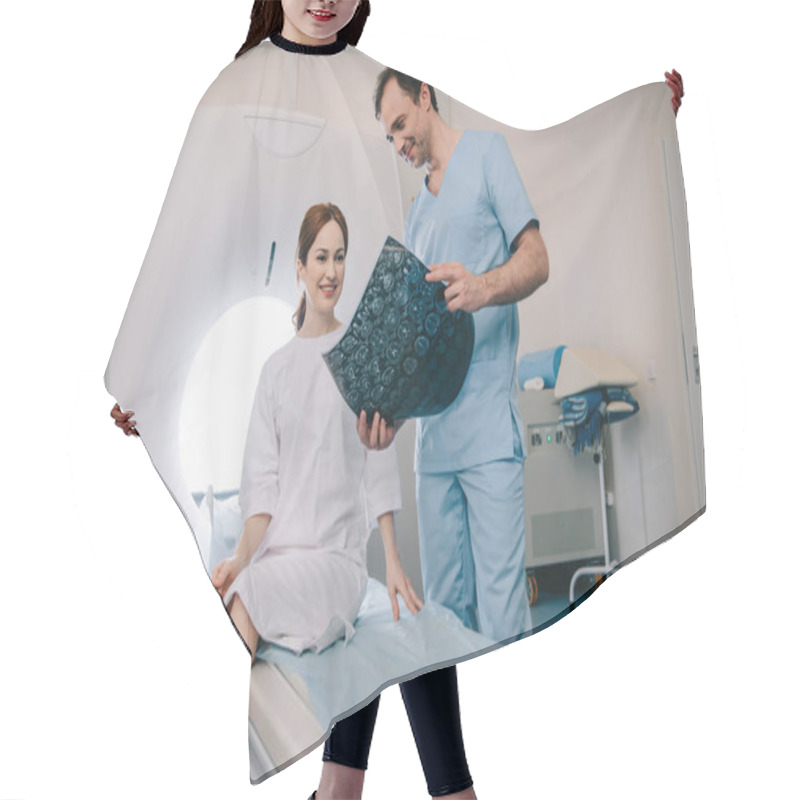 Personality  Smiling Radiologists Showing X-ray Results To Happy Attractive Woman Hair Cutting Cape