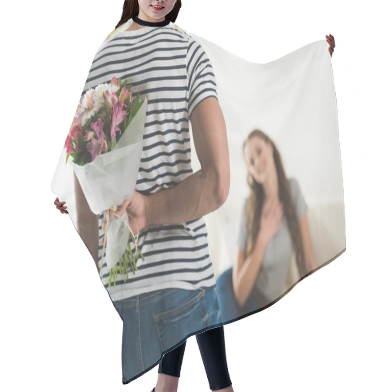 Personality  Cropped Shot Of Young Man Hiding Bouquet Behind Back To Present It To Girlfriend Hair Cutting Cape