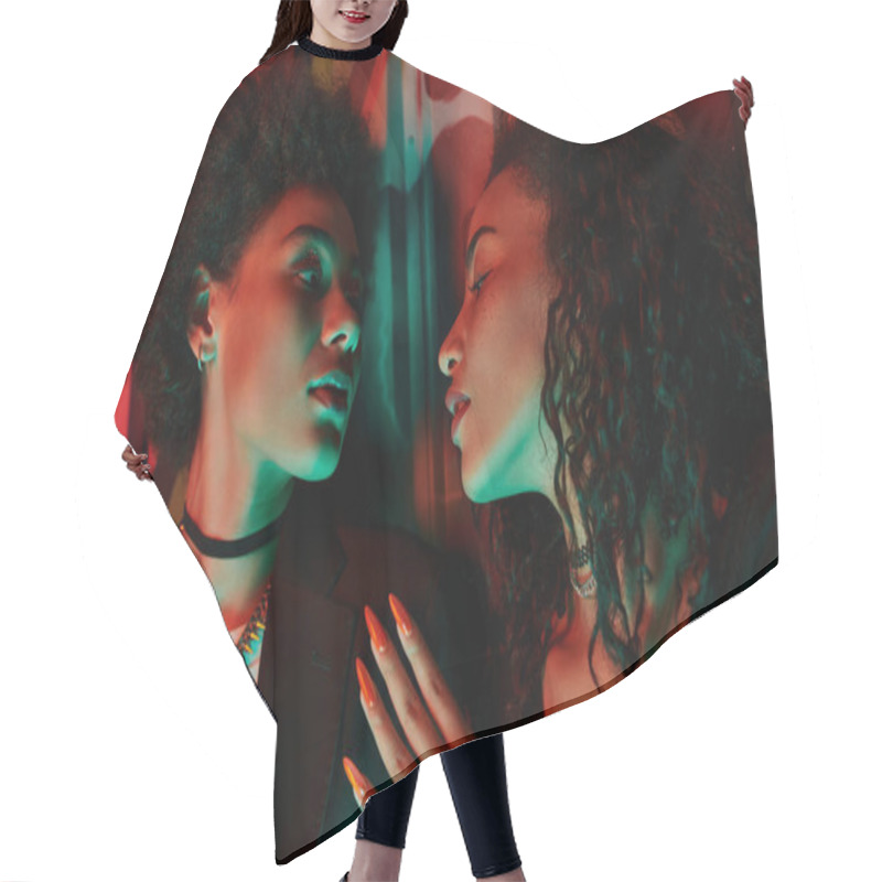 Personality  Two Women Share An Intimate Moment, Surrounded By Vibrant Fabrics. Hair Cutting Cape