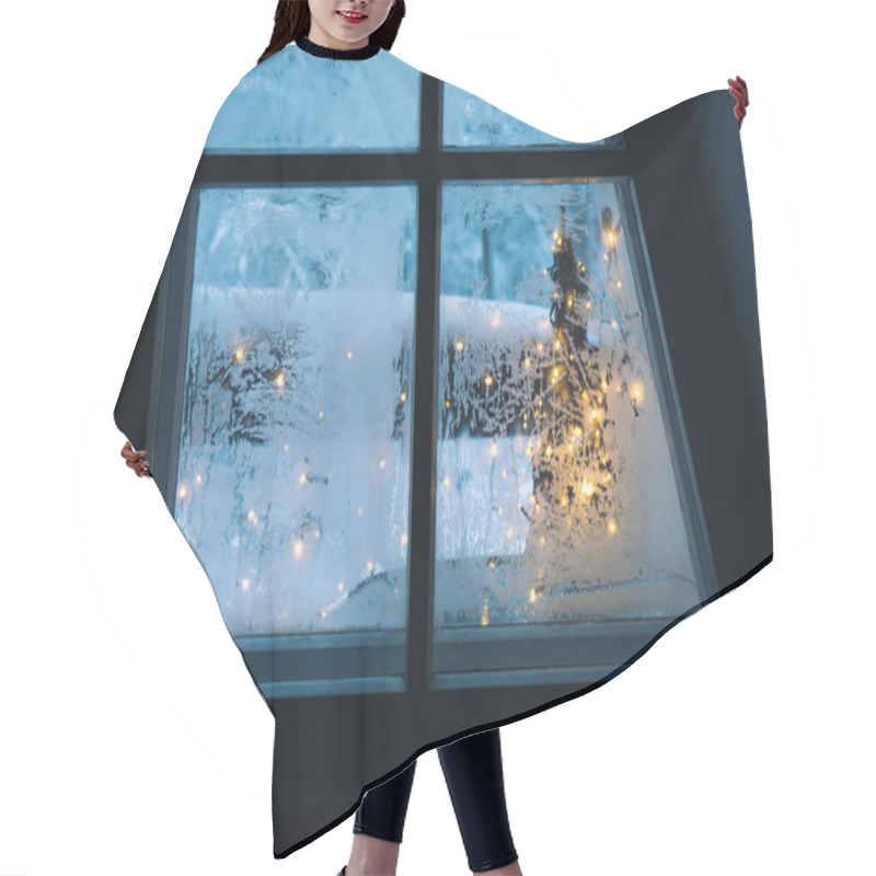 Personality  Looking Out The Frosty Winter Window. Christmas Lights And Snow On Background. Cozy Holiday Concept. Hair Cutting Cape