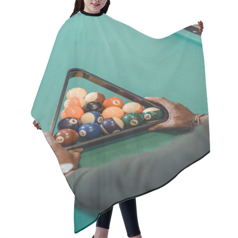 Personality  Cropped Image Of Male Hands Forming Set Of Billiard Balls By Triangle Hair Cutting Cape