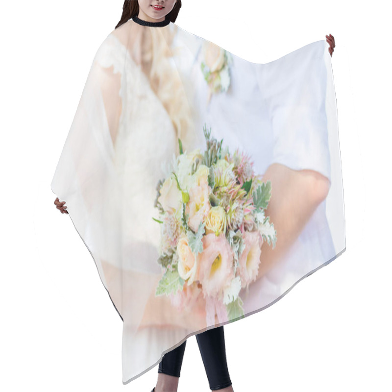 Personality  A Wedding Bouquet In The Hand. A Bouquet Of Flowers As A Symbol Of Love Is Held By A Couple In Love During The Wedding. Light Gentle Style Hair Cutting Cape