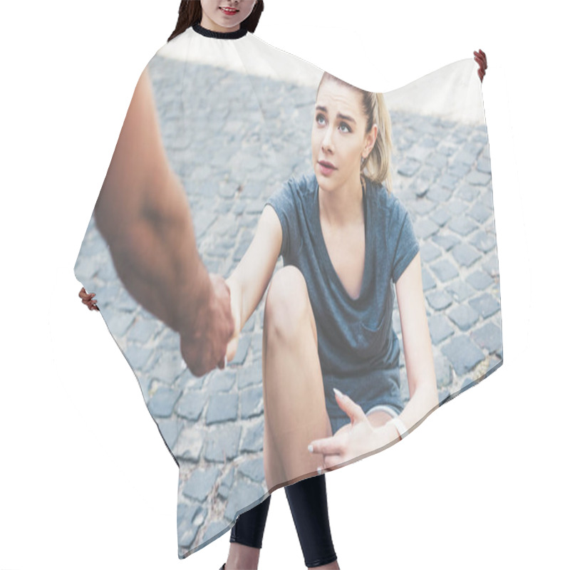 Personality  Partial View Of Man Giving Hand To Young Injured Sportswoman Sitting On Pavement Hair Cutting Cape