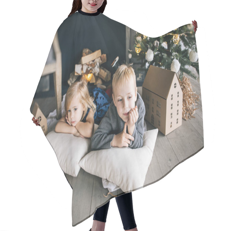 Personality  Children - A Boy And A Girl Are Lying By The Fireplace, Christmas Tree And Cardboard Houses, Cozy Christmas Decor And Children's Emotions Hair Cutting Cape