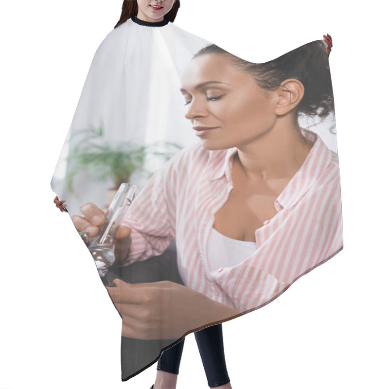 Personality  African American Woman Holding Glass Bong With Dried Medical Cannabis  Hair Cutting Cape