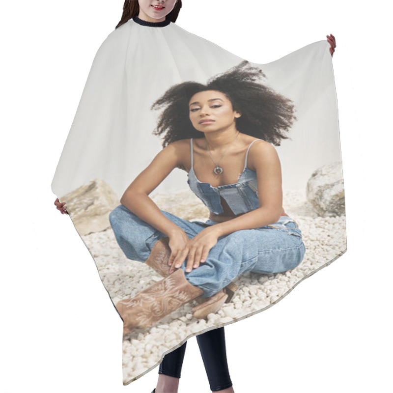 Personality  A Beautiful Young Woman Showcases Her Fashion Sense In A Relaxed Pose On Soft Pebbles. Hair Cutting Cape