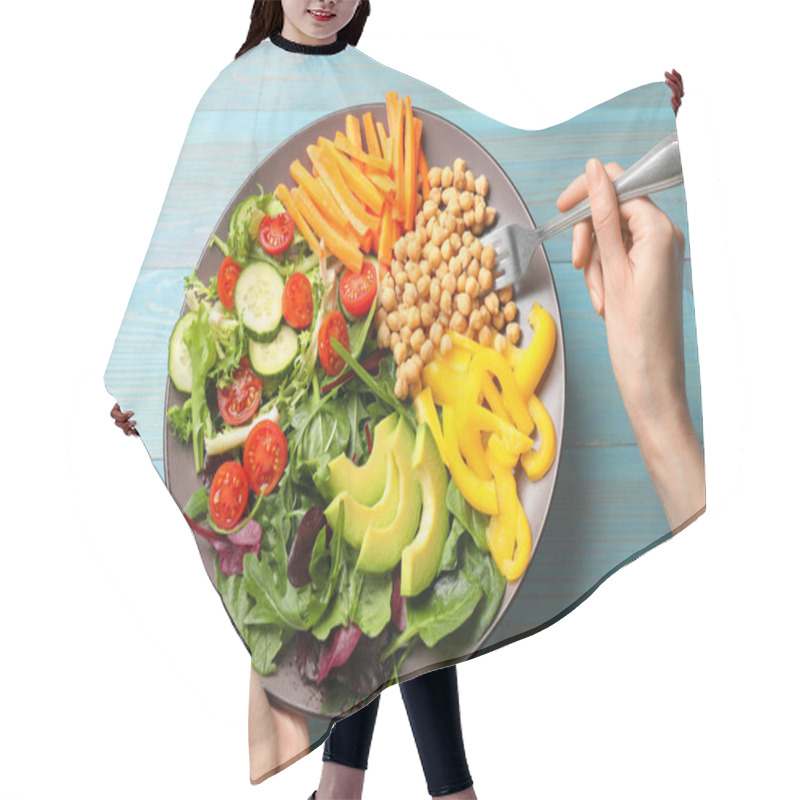 Personality  Balanced Diet And Vegetarian Foods. Woman Eating Dinner At Light Blue Wooden Table, Closeup Hair Cutting Cape