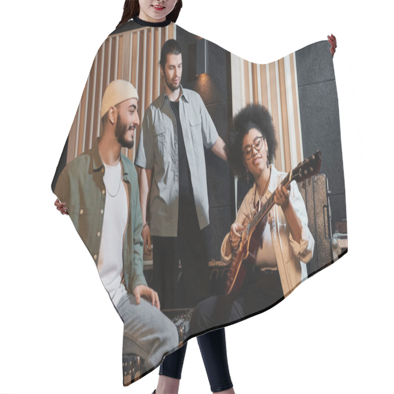 Personality  Three Individuals Sitting In A Recording Studio, Immersed In Playing A Guitar And Creating Music Together. Hair Cutting Cape