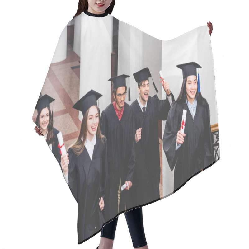 Personality  Smiling Students In Graduation Gowns Holding Diplomas In University  Hair Cutting Cape