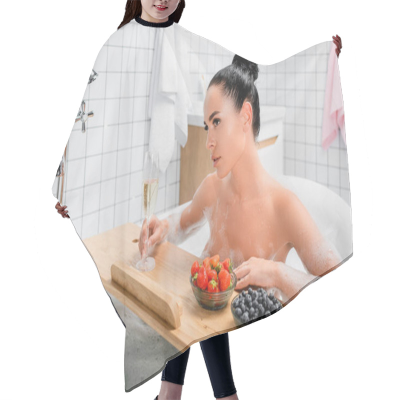 Personality  Sensual Woman Holding Glass Of Champagne Near Berries On Bathtub Tray  Hair Cutting Cape