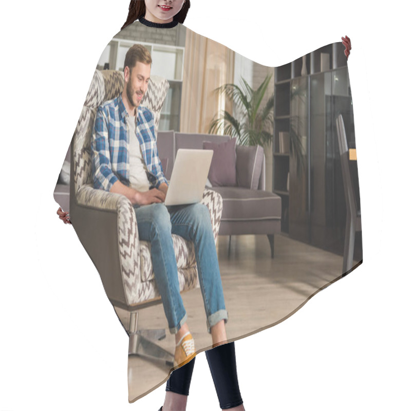 Personality  Young Male In Armchair Using Laptop In Living Room With Modern Design Hair Cutting Cape