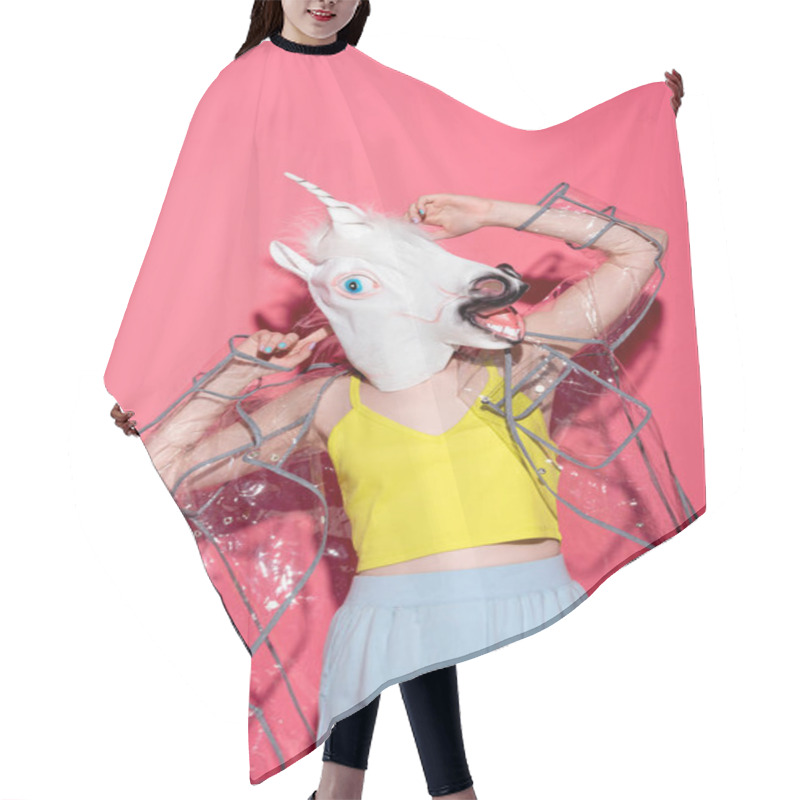 Personality  Ridiculous Woman In Fashionable Transparent Raincoat And Unicorn Mask On Red Hair Cutting Cape