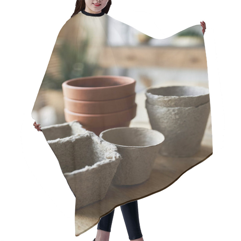 Personality  Clay Pots On Table In Studio. Hair Cutting Cape