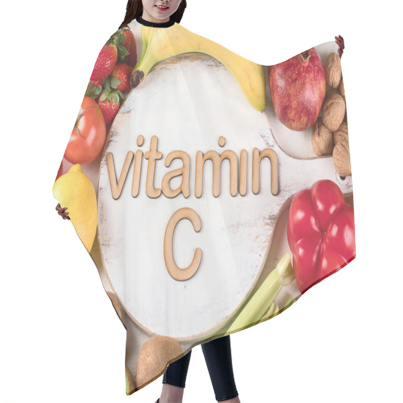 Personality  Vitamin C Rich Foods. Top View. Healthy Eating Concept Hair Cutting Cape