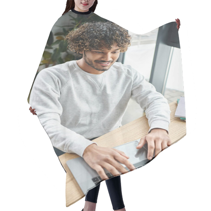 Personality  A Man From Diverse Group Works On Laptop At A Table In A Modern Coworking Space. Hair Cutting Cape