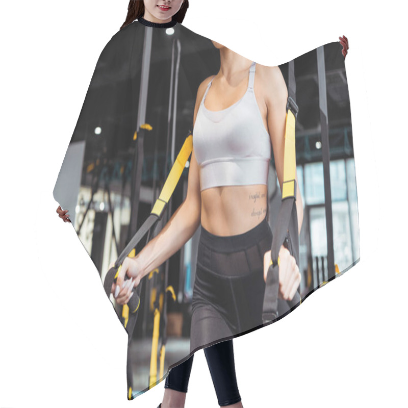 Personality  Cropped View Of Attractive Sportive Girl Exercising With Suspension Straps In Sports Gym  Hair Cutting Cape