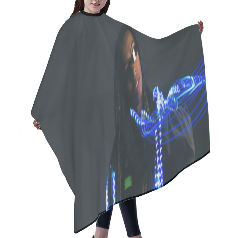 Personality  African American Woman In Smart Glasses Standing Near Neon Lights On Grey Background, Banner  Hair Cutting Cape