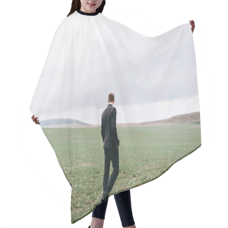 Personality  Rear View Of Man Wearing Dark Evening Tuxedo Walking On Green Field Hair Cutting Cape