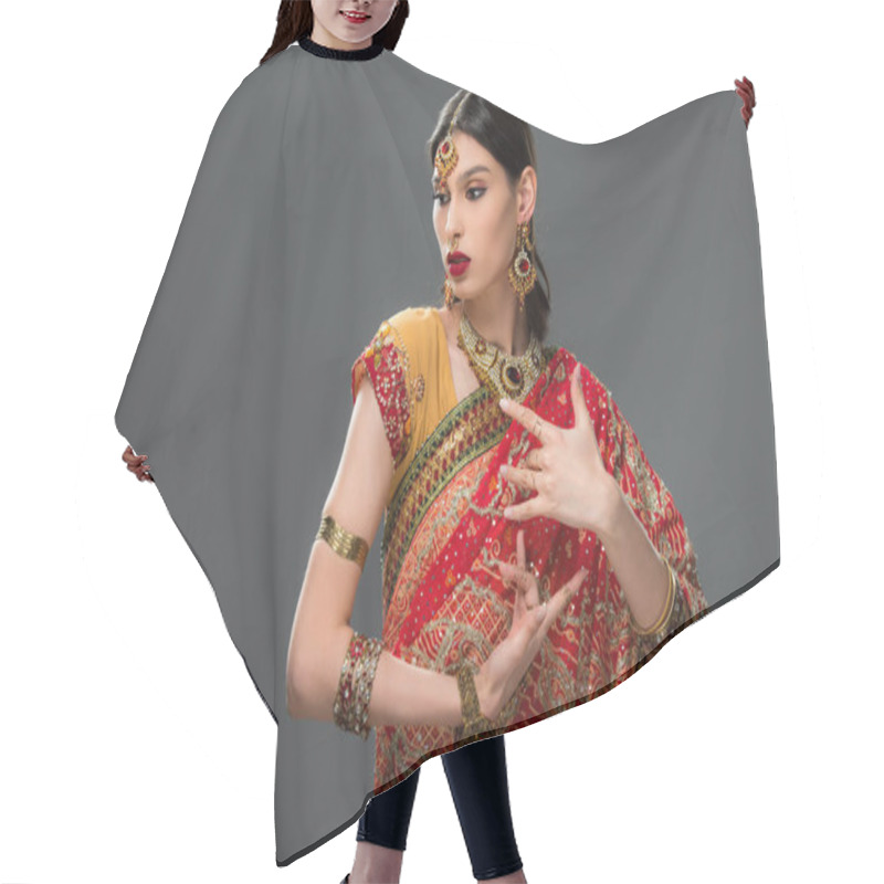 Personality  Attractive Indian Woman Gesturing In Sari And Accessories, Isolated On Grey  Hair Cutting Cape