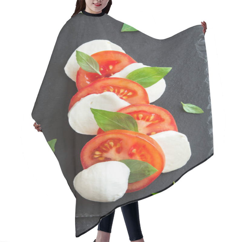 Personality  Traditional Italian Caprese Salad - Sliced Tomatoes, Mozzarella Cheese And Basil On Dark Stone Background, Top View, Copyspace. Caprese Salad, Italian Mediterranean Food. Hair Cutting Cape