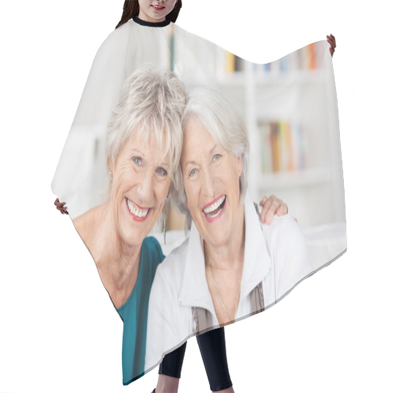 Personality  Senior Friends Sitting On Sofa Hair Cutting Cape