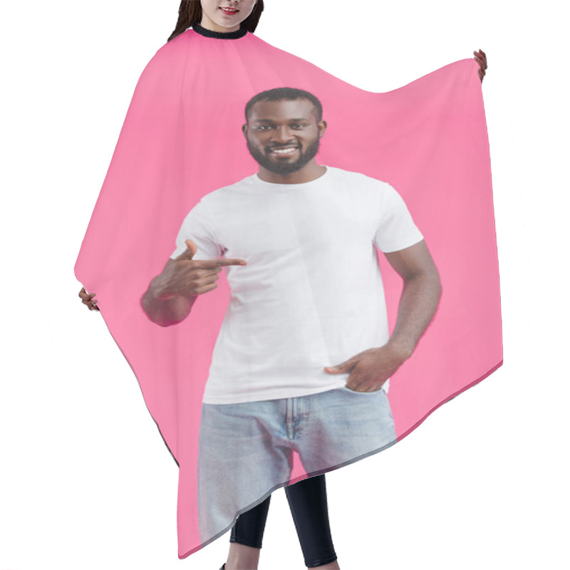 Personality  Portrait Of Young Smiling African American Man Pointing Away Isolated On Pink  Hair Cutting Cape