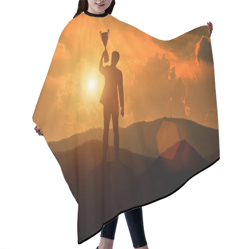 Personality  Silhouette Of A Man Holding A Trophy Cup. Success Concept. Hair Cutting Cape