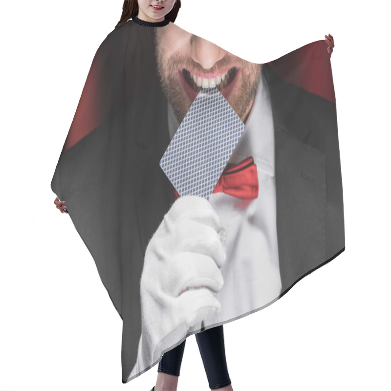 Personality  Cropped View Of Smiling Magician Holding Playing Card In Teeth In Circus With Red Curtains Hair Cutting Cape