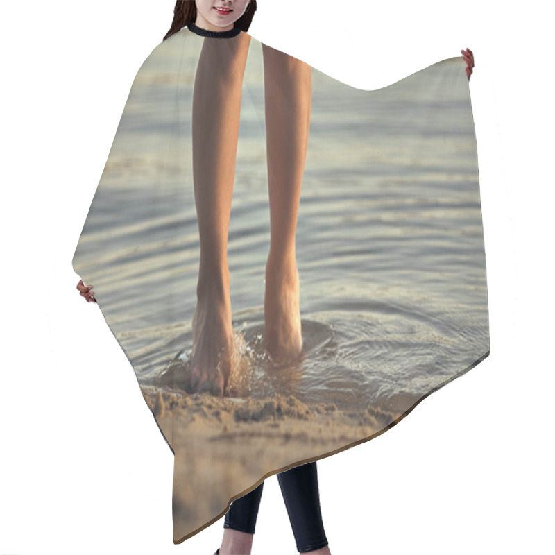 Personality  Female Feet Barefoot On A Sandy Beach In The Water. Close-up Of Beautiful Female Legs. Wet Foot. Hair Cutting Cape