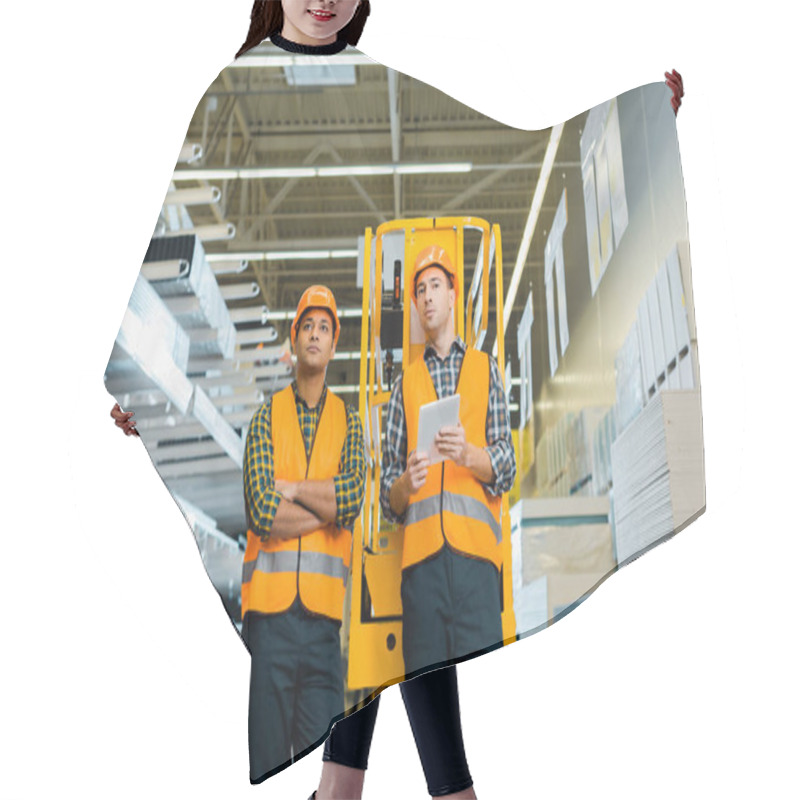 Personality  Selective Focus Of Serious Multicultural Workers Standing Near Scissor Lift Hair Cutting Cape