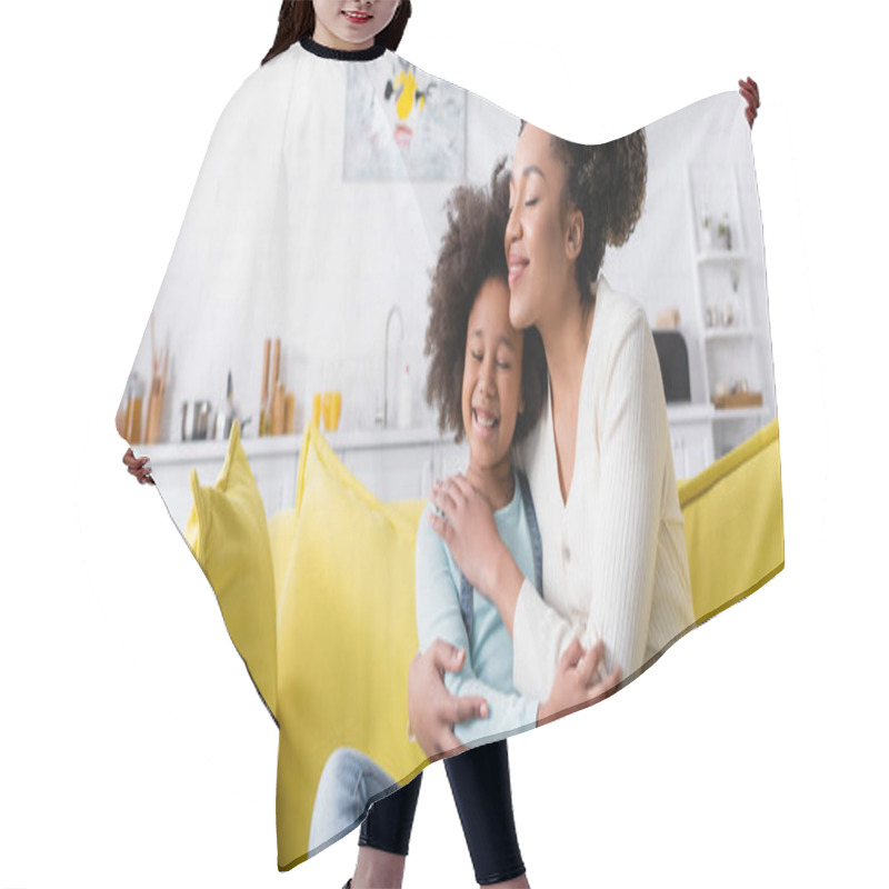 Personality  Happy African American Child And Mom Embracing With Closed Eyes On Couch At Home, Banner Hair Cutting Cape