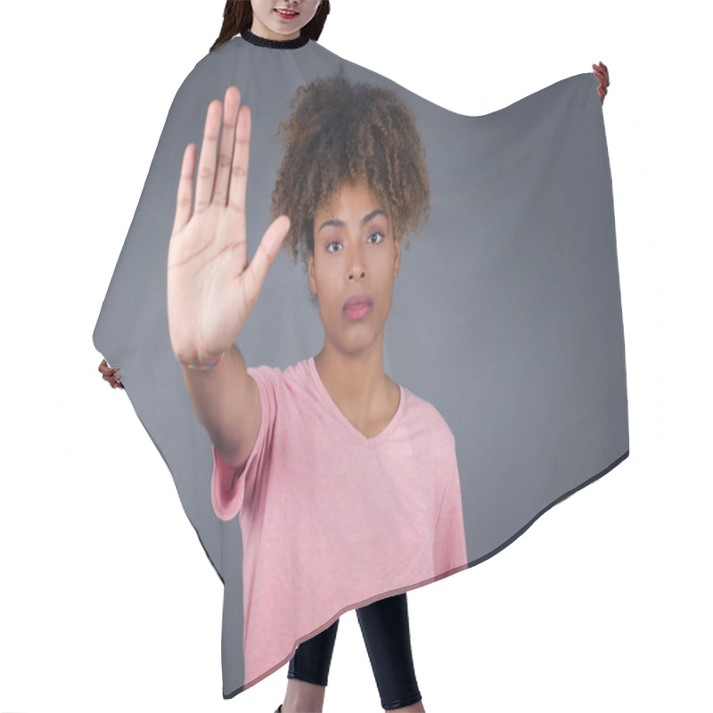 Personality  Young Beautiful African American Woman  Doing Stop Gesture With Palm Of The Hand. Warning Expression With Negative And Serious Gesture On The Face Isolated Over Gray Background. Hair Cutting Cape