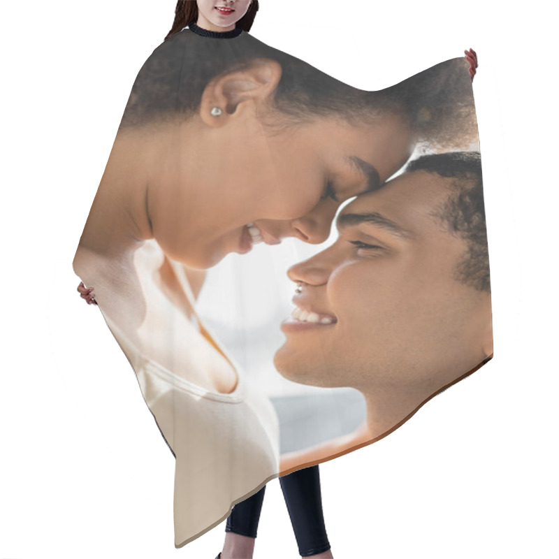 Personality  Side View Of African American Couple Smiling Face To Face At Home Hair Cutting Cape