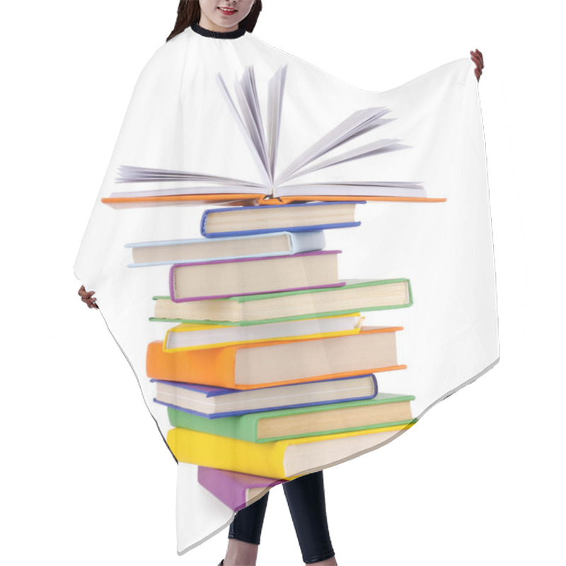 Personality  Composition With Stack Of Books On A White Background. Hair Cutting Cape