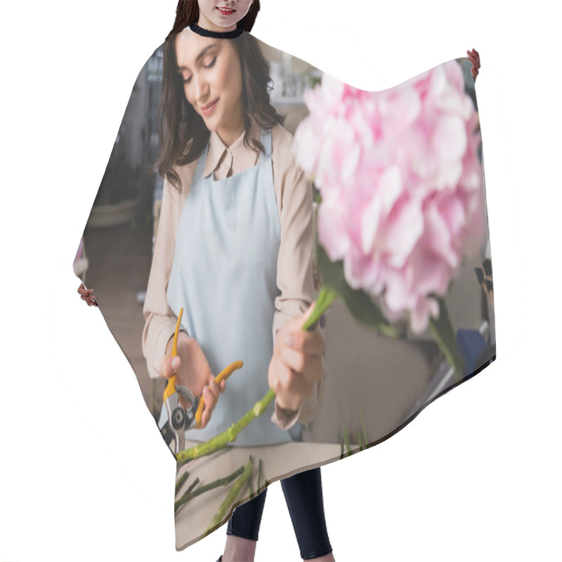 Personality  Positive Female Florist Cutting Stalk Of Plant Near Desk With Blurred Hydrangea On Foreground Hair Cutting Cape