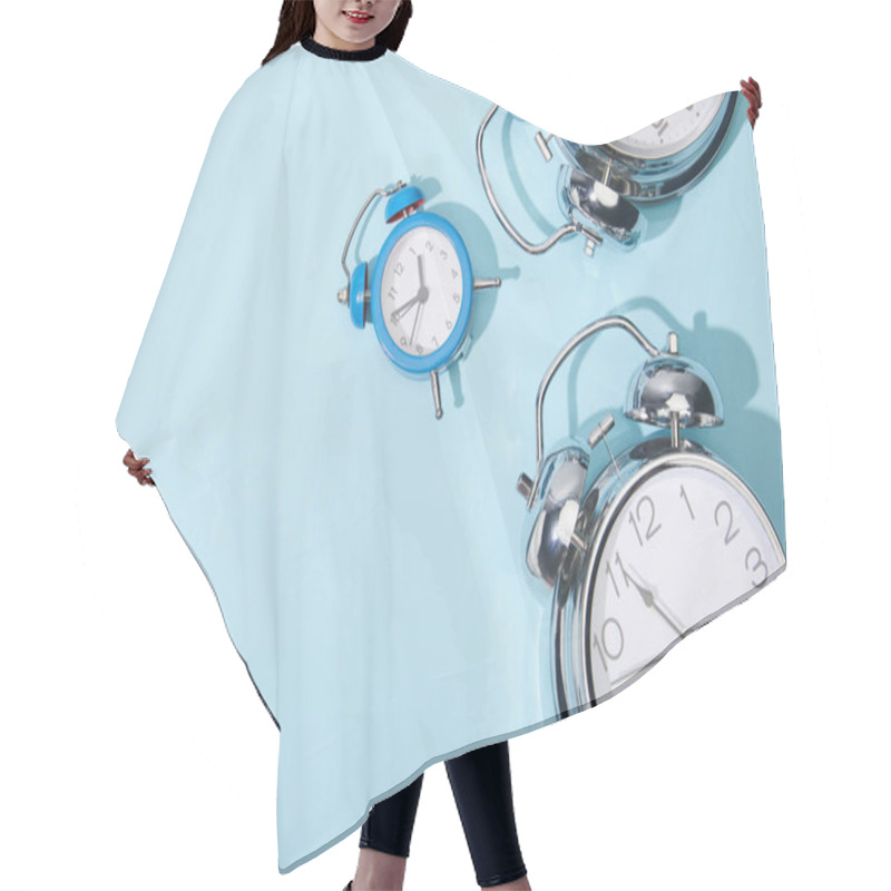 Personality  Top View Of Classic Alarm Clocks On Blue Background Hair Cutting Cape