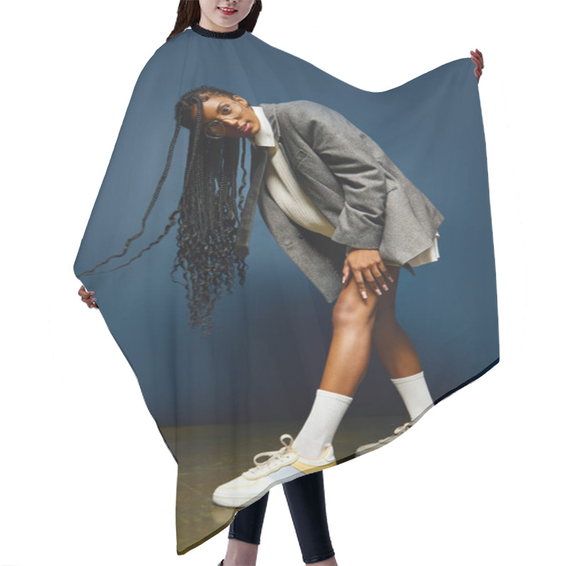 Personality  A Young Woman Shows Off Her Playful Fashion Sense With A Dynamic Indoor Pose. Hair Cutting Cape