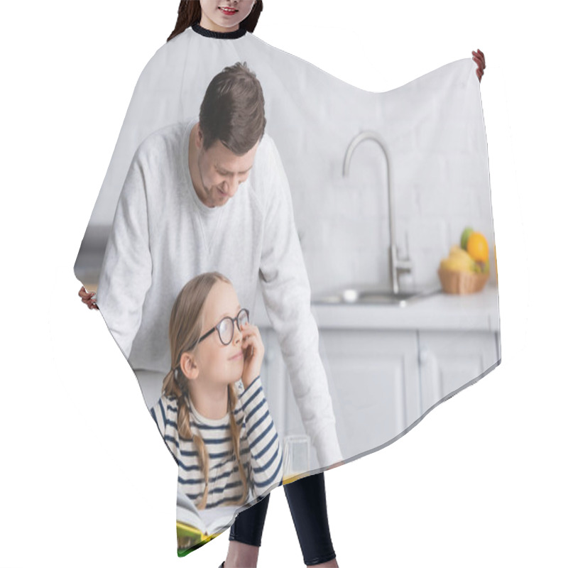 Personality  Man Standing Near Smiling Daughter Doing Homework In Kitchen Hair Cutting Cape