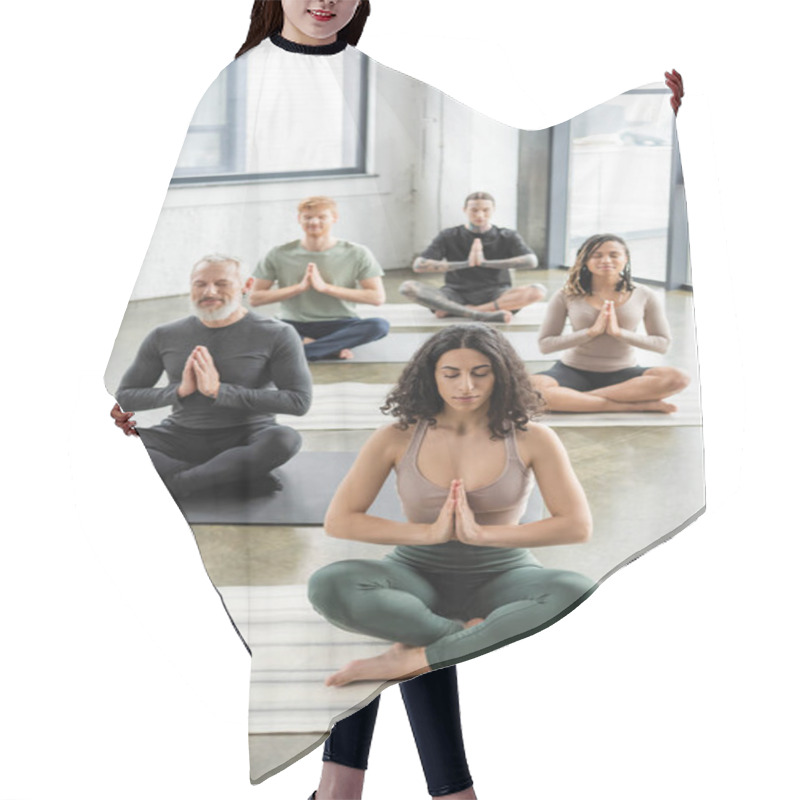 Personality  Middle Eastern Woman Sitting In Lotus Pose And Meditating In Yoga Class  Hair Cutting Cape