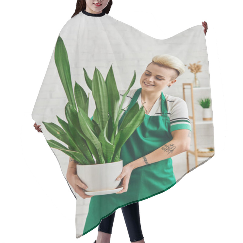 Personality  Happiness, Cheerful Tattooed Woman With Trendy Hairstyle Holding Flowerpot With Exotic Foliage Plant In Modern Living Room, Eco-conscious Lifestyle, Sustainable Home Decor And Green Living Concept Hair Cutting Cape