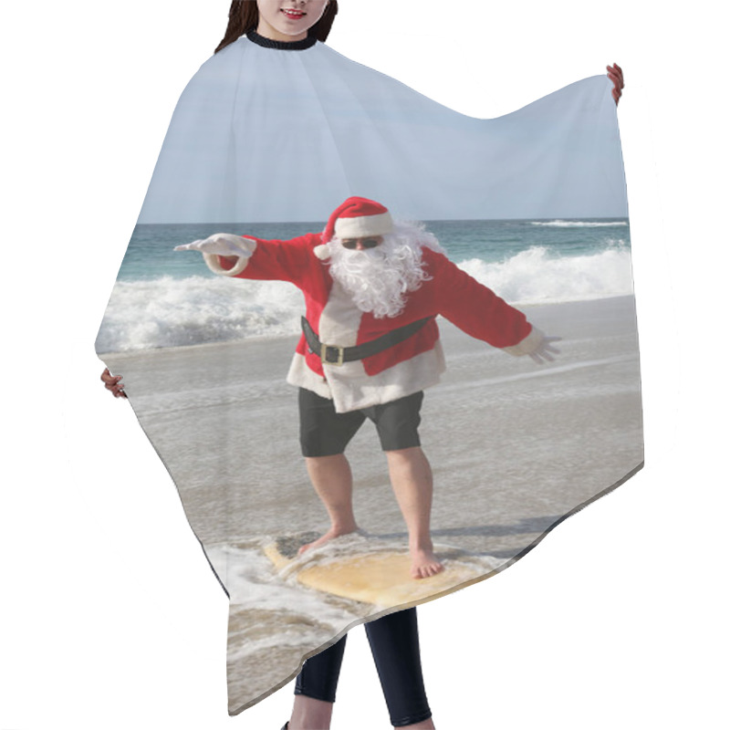 Personality  Surfing Santa. Santa Claus Is Riding A Surf Board. Santa Claus In Sunglasses Surfing In The Ocean. Santa Claus Surfs On His Surf Board While On A Beautiful Beach With A Blue Ocean. Christmas Vacation. Hair Cutting Cape