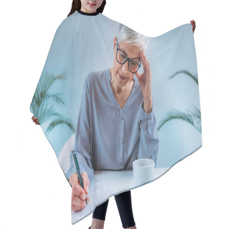 Personality  Cognitive Training. Senior Woman Solving Sudoku Puzzles. Hair Cutting Cape