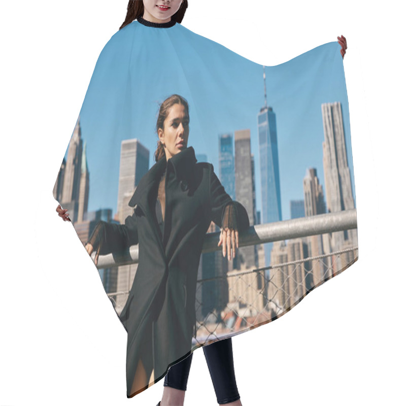 Personality  A Woman In A Black Coat Poses Against The New York City Skyline. Hair Cutting Cape