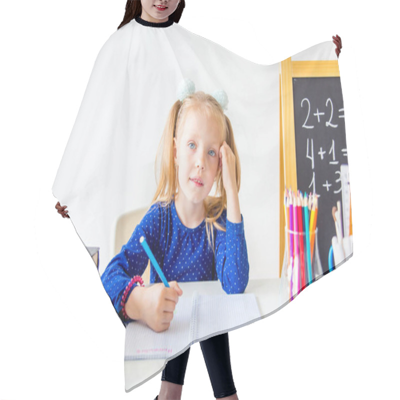 Personality  Happy Cute Industrious Child Is Sitting At A Desk Indoors Hair Cutting Cape